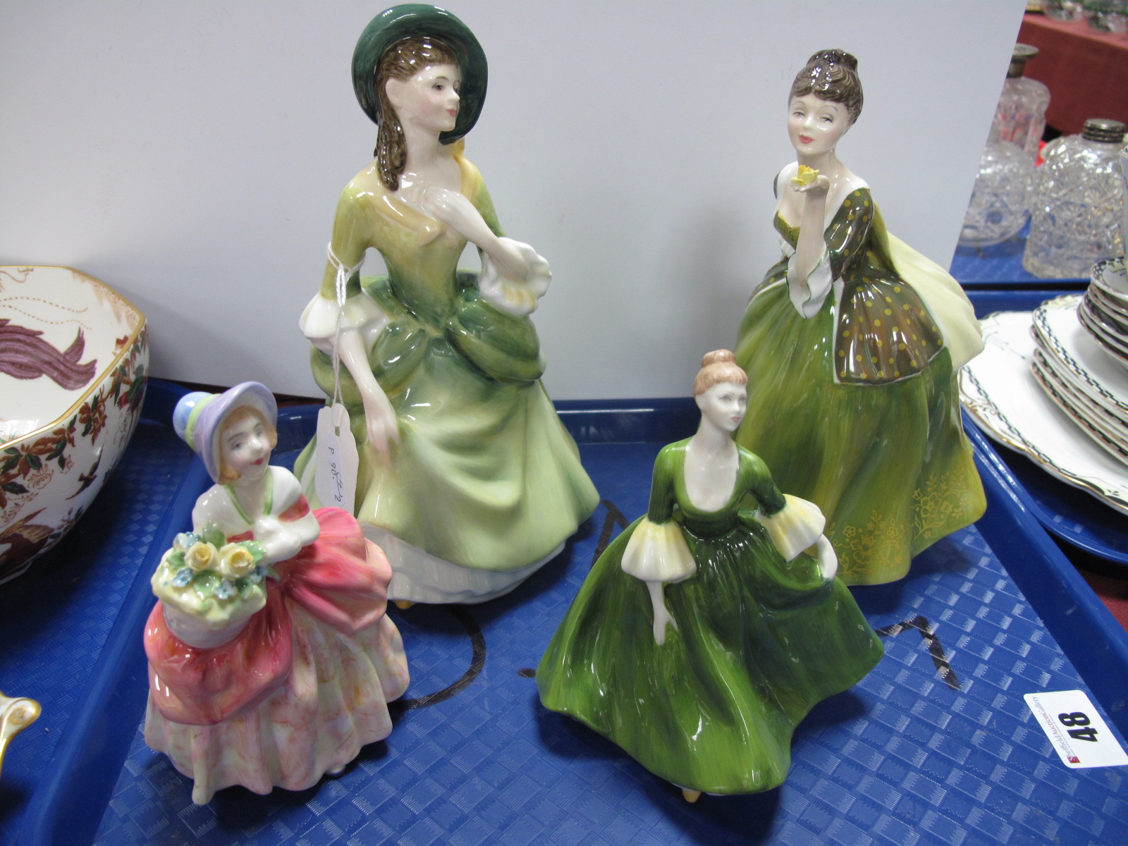 Royal Doulton Figurines; Fleur HN 2368, Sandra HN 2401, Cissie HN1809 and Coalport 'Mary'. (4)