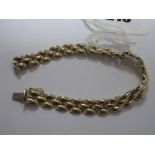 A 9ct Gold Bracelet, of geometric design, to snap clasp.