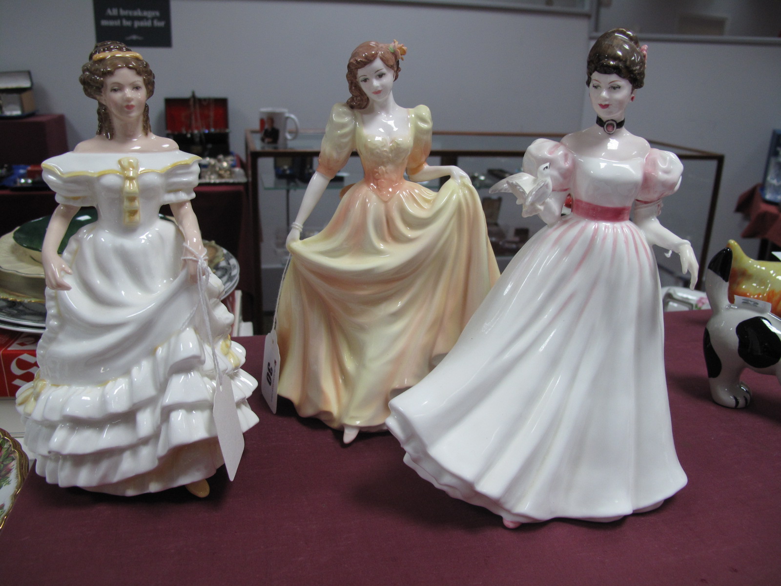 Coalport 'Vanessa', Royal Doulton 'Angela 'HN 3690 and 'Kathleen' HN 3880, china figurines. (3)