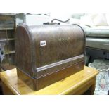 An Early XX Century Oak Domed Cased Singer Sewing Machine.