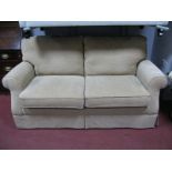 Beige Fabric Covered Two Seater Settee.