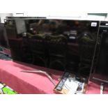 A Samsung 40" Flatscreen TV, model YE40 F6500 SBXXU. 3D full HD series 6 with glasses (boxed and