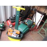 A Qualcast Concorde 32 Lawn Mower, 400w lawn raker, seed dispenser, (tested), B & D cordless