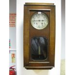 A 1940's Oak Cased Wall Clock, with a silvered dial, glazed door.