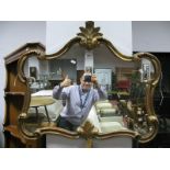 A Gilded Wall Mirror, with 'C' scroll decoration.