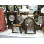 An Early XX Century Oak Cased Mantel Clock, with a silver dial, with brass and oak columns,