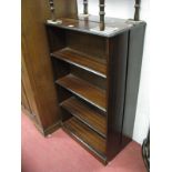 A Pair of Mahogany Bookcases, with three fixed shelves on plinth bases.