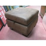 A Brown Leather Pouffe.