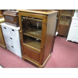 A Woven Cane Chest of Four Drawers, two small over two long, in white and a pine glazed cabinet. (