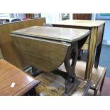 A 1920's Oak Barley Twist Table, together with an oak drop leaf table. (2)