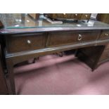 A Stag Style Dressing Table, with a central mirror, side mirrors, three top drawers.