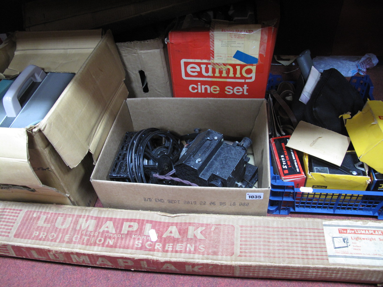 Five Boxes of Vintage Cameras, projectors, floodlights etc; plus two boxed projector screens.