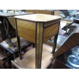 A Walnut Sewing Table, with a hinged lid, single drawer, together with an Ercol style, trolley. (2)