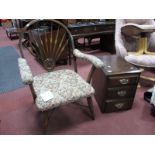 A 1920's Ash Armchair, with a hooped back, upholstered arms and seat, together with an oak three