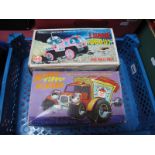 Two Battery Operated Plastic Toy Vehicles by Marx, comprising a four wheel drive hill climbing Lunar