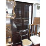 A Stag Mahogany Display Cabinet, with twin glazed doors, over panelled doors 96cm wide.