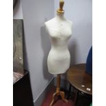 A Mannequin, on a tripod base.