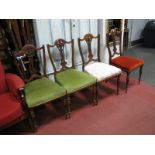 A Set of Four Early XX Century Walnut Salon Chairs, with pierced splat upholsted seats, on turned