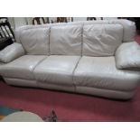 A Light Brown Leather Three Seater Settee.