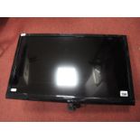 A Panasonic 24" LCD TV, model TX-24ASS10B - fitted for wall mounting, no stand.