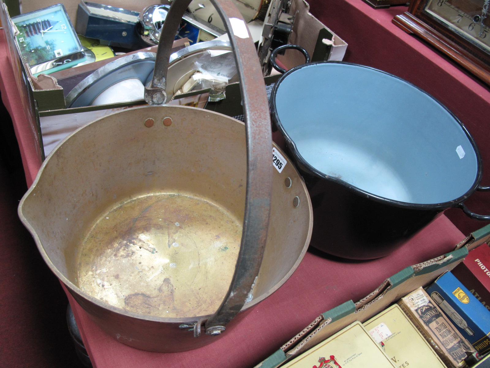 An Early XX Century Brass Jam Pan, an enamel twin handled pan. (2)