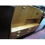 A G-Plan Style Sideboard, top with three cupboards, over drawers and a fall front cupboard door,