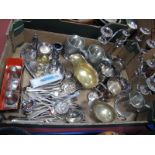 A Pair of Electroplated Three Branch Candelabra, scrolled arms and cast borders, loose cutlery,
