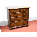 A Titchmarsh & Goodwin Oak Chest of Drawers, with moulded edge, two small over four long drawers, on