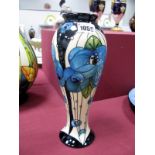 A Moorcroft Pottery Vase, painted in the 'Rennie Rose' (blue) pattern, designed by Rachel Bishop,