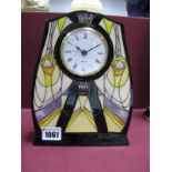 A Moorcroft Pottery Clock, painted in the 'Basset-Lowke pattern, designed by Vicky Lovatt, impressed