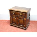 A Titchmarsh & Goodwin Oak Miniature Cabinet, the top with moulded edge, single drawer and arched