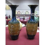 A Pair of Royal Doulton Stoneware Vases, of ovoid form with long necks with outcurved rims, designed