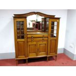 An Early XX Century Oak Breakfronted Cabinet, with central bevelled mirror, two drawers over