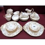 A Rockingham Porcelain Tea and Coffee Service, decorated in pattern 1512 with flowers and foliage in