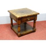 A Titchmarsh & Goodwin Oak End Table, with a single drawer, on turned and block supports, with