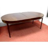 A XIX Century Mahogany Extending Dining Table, with 'D' ends, on tapering moulded legs, with two