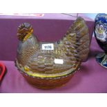 A Circa 1940's Amber Glass 'Chicken' Egg Basket.