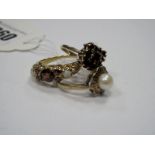 A 9ct Gold Dress Ring, claw set highlights, between tapered shoulders, a 9ct gold imitation pearl