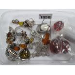 A Mixed Lot of Assorted Amber Coloured Jewellery, including earring studs, wire drops, pendants on