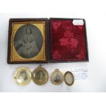 A XIX Century Daguerreotype of A Lady, together with two circular locket pendants, one engine