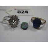 A Single Stone Ring, the oval doublet (damages) four claw set, stamped "9ct"; together with