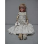 An Early XX Century Porcelain Headed Doll, with head stamped '370 130DEP', with sleepy eyes, open