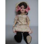 An Early XX Century Porcelain Headed Doll by Armand Marseille of Germany, head stamped '390 A3M',