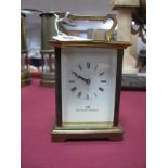 Matthew Norman Brass Cased Carriage Clock, with Swiss movement, black Roman numerals to white dial.