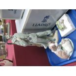 Lladro 'Spanish Policeman', 'Lucky Frog' (boxed), 'It Wasn't Me', and a spare Lladro box. (4)