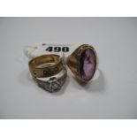 A 9ct Gold Band, a stone set ring, oval collet set, indistinctly stamped and another ring,