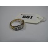 A 18ct Gold Three Stone Diamond Ring, rubover set, stamped ".50".