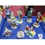 Eight German Porcelain Figurines, including Flautist, Gold Anchor Flower Carriers, 'Dresden Dee',