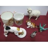 Beswick Sheep, Doulton kitten, plus lapping dog (damaged), Penguin two commemorative mugs, swallow.