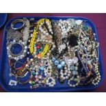 A Mixed Lot of Assorted Costume Jewellery, bead necklaces, bangles and bracelets:- One Tray
